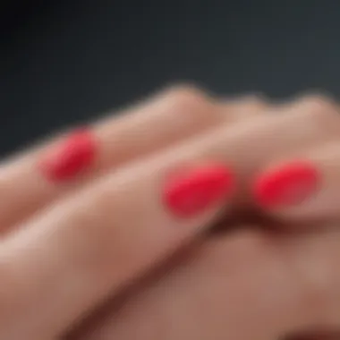 Close-up of a shellac nail application in progress with vibrant colors