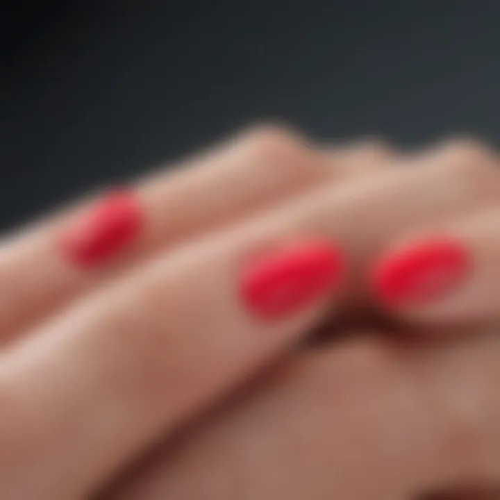 Close-up of a shellac nail application in progress with vibrant colors