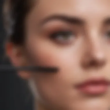 Expert applying mascara with precise technique