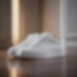 Elegant white sneakers on a stylish surface