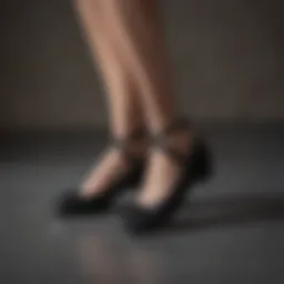 Elegant black ballet flats displayed on a stylish surface