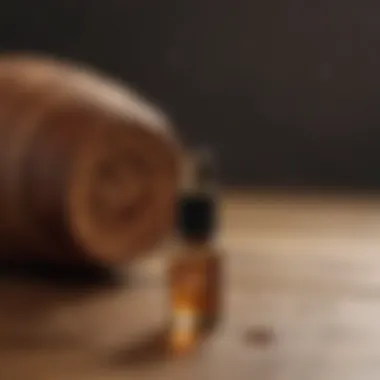 Close-up of essential oil drops on a wooden surface.