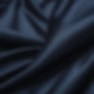 Close-up of luxurious fabric texture of Ralph Lauren navy sheets