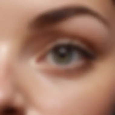 Close-up of a delicate eye area with a soothing lotion applied