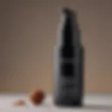 Close-up of a dark spot corrector serum bottle against a neutral background