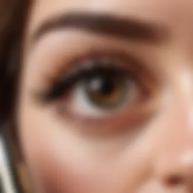 Close-up of an eyelash growth serum bottle with a brush applicator