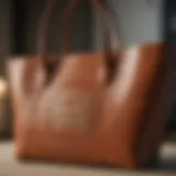 Detailed view of the Lina Medium Logo Faux Leather Tote Bag showcasing its texture and craftsmanship.