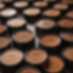 Close-up of various bronzing powders in elegant packaging