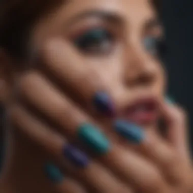 Close-up of nails painted in rich jewel tones