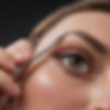 Close-up of tweezers in use