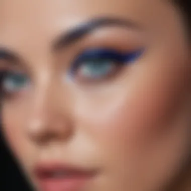 Model showcasing the elegance of blue eyeliner on the waterline