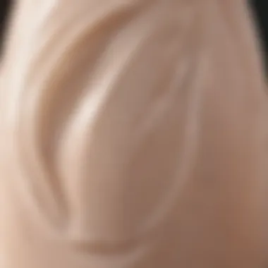 A close-up view of a firming lotion bottle highlighting its texture