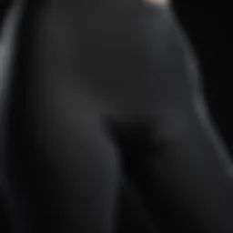 Close-up of fabric texture showcasing durability and stretch of thick black high-waist leggings