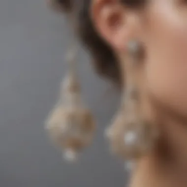 Layered pearl earrings with intricate details