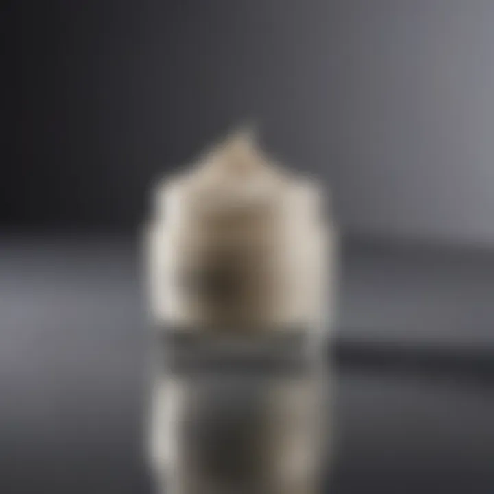 A close-up of a cream jar with a glossy finish and intricate design